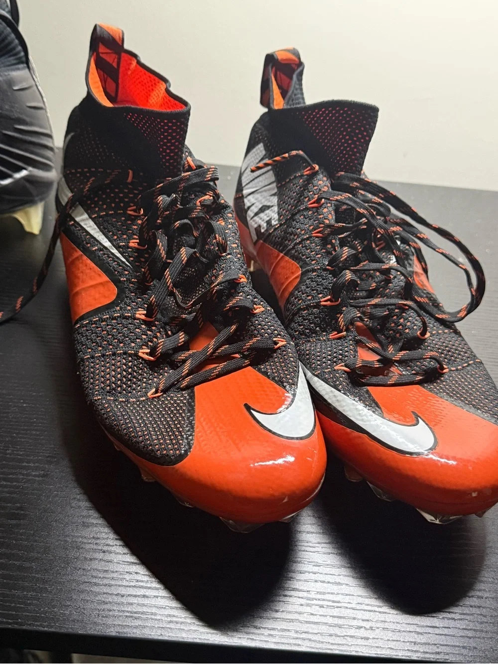 Nike Black and Orange Soccer Cleats with White Swoosh